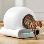 Bengal cat exiting white Tonepie smart self-cleaning litter box with modern dome design and touchscreen control panel